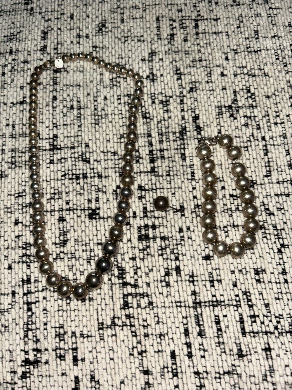 Tiffany & Co. Silver Ball Necklace and Bracelet Set with Single Earring
